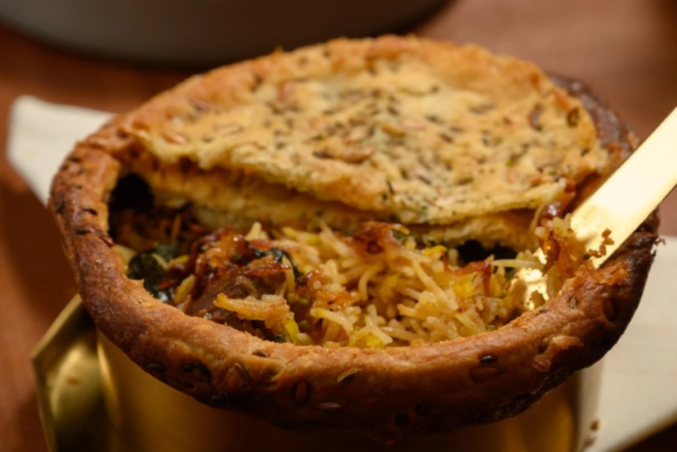 698c44d1482dd_the-oberoi-new-delhi-dhilli-dum-purda-mutton-biryani-nizamuddin