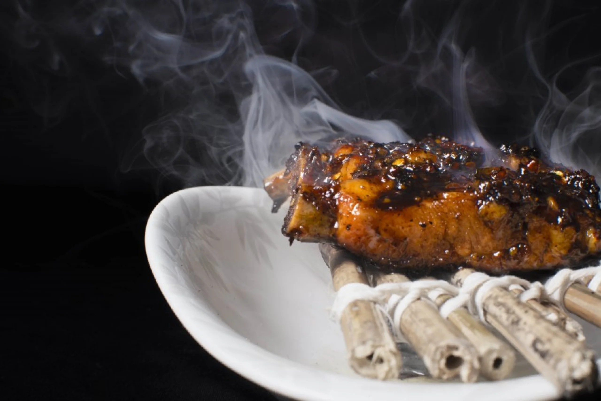 698c59b1cbc9e_thai-grilled-pork-rib-rim-naam-the-oberoi-bengaluru-